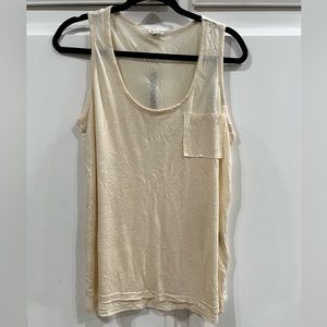 POL cream tank top, lightweight with raw hem pocket and side slit detail